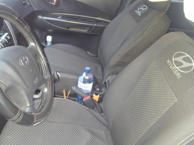 Черный Хендай Туксон, объемом двигателя 2 л и пробегом 224 тыс. км за 6800 $, фото 5 на Automoto.ua