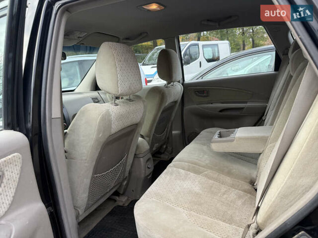 Черный Хендай Туксон, объемом двигателя 2 л и пробегом 211 тыс. км за 4444 $, фото 11 на Automoto.ua