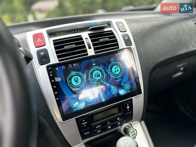 Черный Хендай Туксон, объемом двигателя 2 л и пробегом 210 тыс. км за 6600 $, фото 45 на Automoto.ua