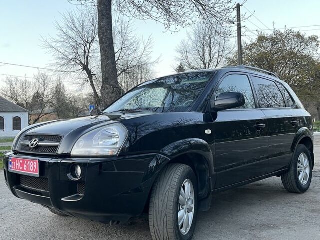 Черный Хендай Туксон, объемом двигателя 2 л и пробегом 137 тыс. км за 7499 $, фото 3 на Automoto.ua