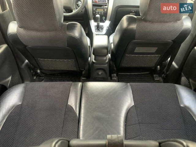 Черный Хендай Туксон, объемом двигателя 2 л и пробегом 219 тыс. км за 8400 $, фото 13 на Automoto.ua