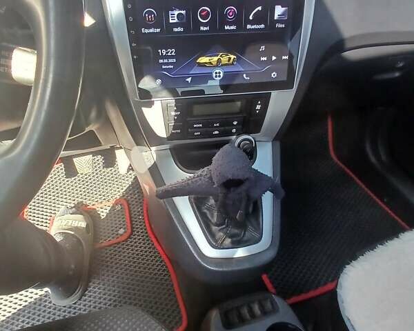 Черный Хендай Туксон, объемом двигателя 2 л и пробегом 315 тыс. км за 7000 $, фото 1 на Automoto.ua