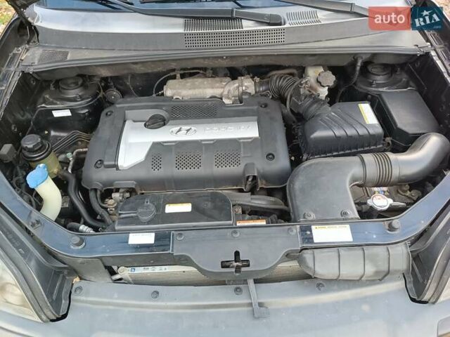 Хендай Туксон 2005 в Харькове на Automoto.ua Черный Хендай Туксон, объемом двигателя 1.98 л и пробегом 192 тыс. км за 7200 $, фото 30 на Automoto.ua
