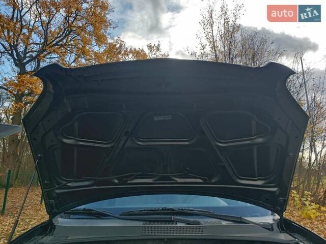 Черный Хендай Туксон, объемом двигателя 1.98 л и пробегом 192 тыс. км за 6900 $, фото 29 на Automoto.ua