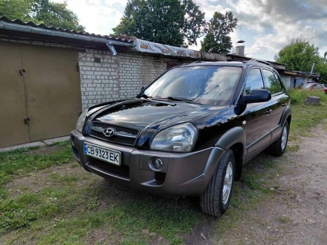 Черный Хендай Туксон, объемом двигателя 2 л и пробегом 238 тыс. км за 8200 $, фото 1 на Automoto.ua