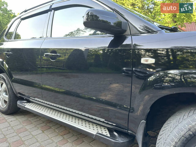 Черный Хендай Туксон, объемом двигателя 2 л и пробегом 210 тыс. км за 6600 $, фото 5 на Automoto.ua