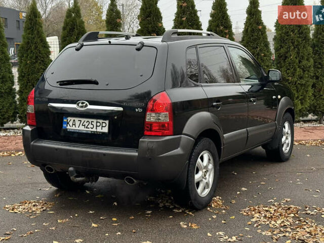 Чорний Хендай Туксон, об'ємом двигуна 2.66 л та пробігом 220 тис. км за 6350 $, фото 3 на Automoto.ua