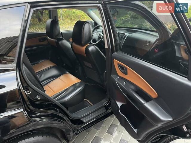 Хендай Туксон 2005 у Хороле на Automoto.ua Чорний Хендай Туксон, об'ємом двигуна 2 л та пробігом 163 тис. км за 7700 $, фото 6 на Automoto.ua