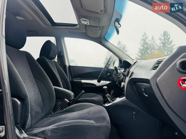 Черный Хендай Туксон, объемом двигателя 1.98 л и пробегом 252 тыс. км за 7300 $, фото 25 на Automoto.ua