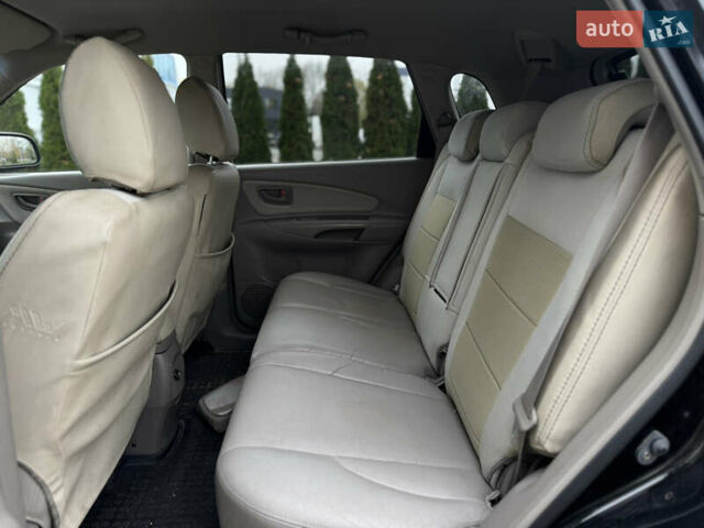 Черный Хендай Туксон, объемом двигателя 2.7 л и пробегом 220 тыс. км за 6400 $, фото 7 на Automoto.ua