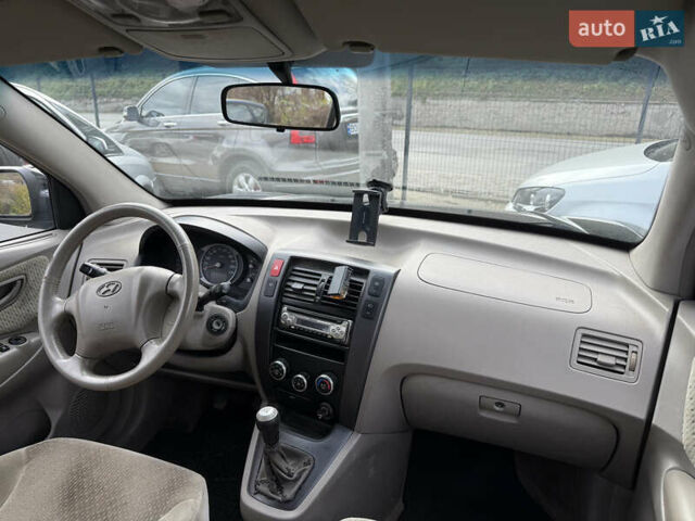 Черный Хендай Туксон, объемом двигателя 2 л и пробегом 211 тыс. км за 4444 $, фото 18 на Automoto.ua