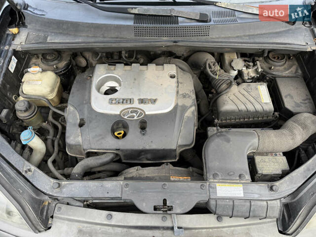 Черный Хендай Туксон, объемом двигателя 2 л и пробегом 211 тыс. км за 4444 $, фото 23 на Automoto.ua