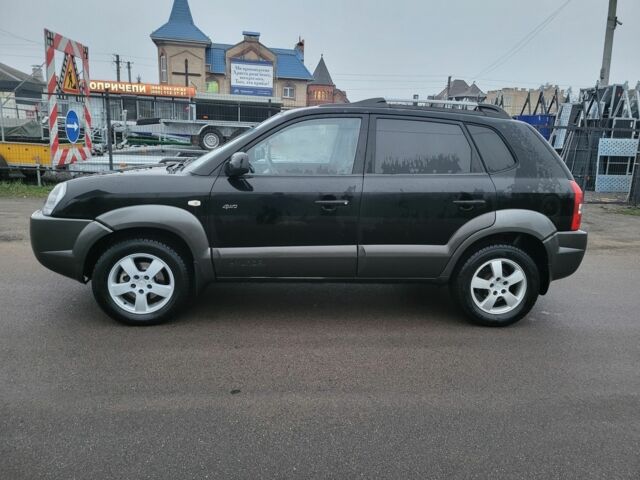 Черный Хендай Туксон, объемом двигателя 2 л и пробегом 180 тыс. км за 4500 $, фото 2 на Automoto.ua