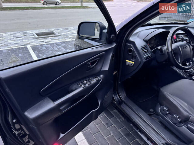 Хендай Туксон 2005 у Полтаві на Automoto.ua Чорний Хендай Туксон, об'ємом двигуна 1.98 л та пробігом 175 тис. км за 7700 $, фото 14 на Automoto.ua