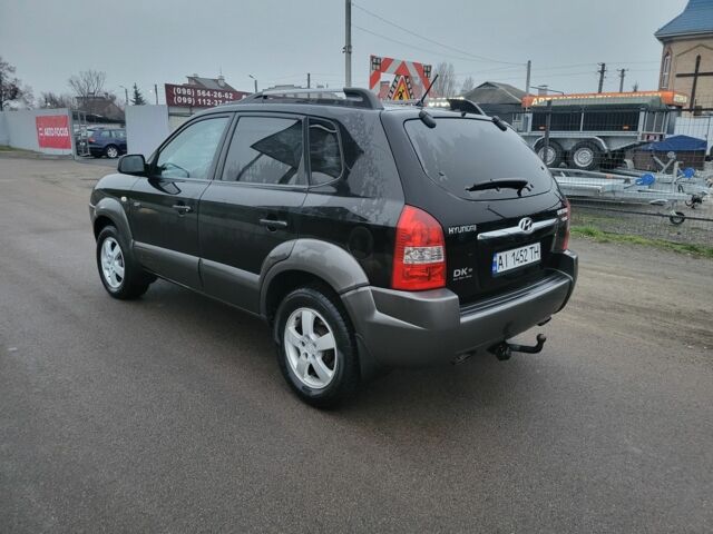Черный Хендай Туксон, объемом двигателя 2 л и пробегом 180 тыс. км за 4500 $, фото 3 на Automoto.ua