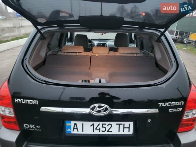 Чорний Хендай Туксон, об'ємом двигуна 2 л та пробігом 180 тис. км за 4500 $, фото 7 на Automoto.ua