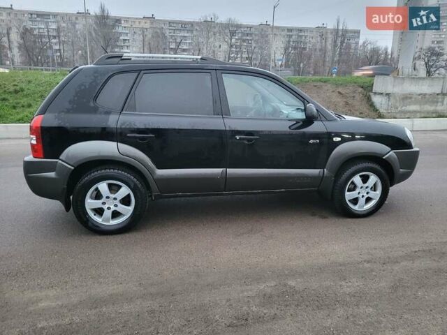 Чорний Хендай Туксон, об'ємом двигуна 2 л та пробігом 180 тис. км за 4500 $, фото 6 на Automoto.ua