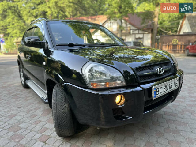 Черный Хендай Туксон, объемом двигателя 2 л и пробегом 210 тыс. км за 6600 $, фото 25 на Automoto.ua
