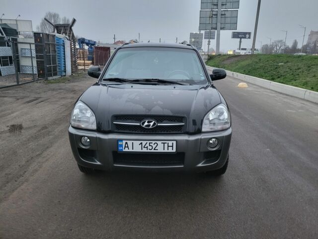 Черный Хендай Туксон, объемом двигателя 2 л и пробегом 180 тыс. км за 4500 $, фото 1 на Automoto.ua