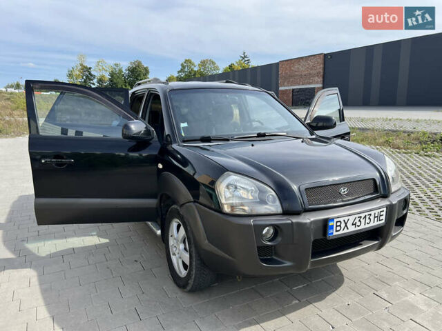 Чорний Хендай Туксон, об'ємом двигуна 2 л та пробігом 255 тис. км за 6900 $, фото 26 на Automoto.ua