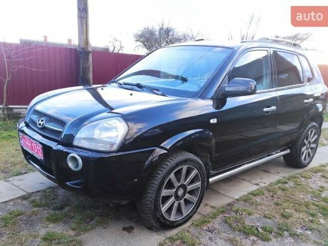 Черный Хендай Туксон, объемом двигателя 2 л и пробегом 208 тыс. км за 6950 $, фото 36 на Automoto.ua