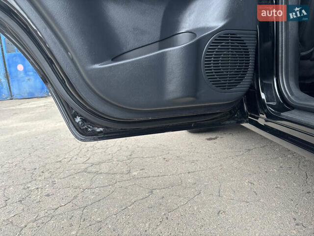 Черный Хендай Туксон, объемом двигателя 1.98 л и пробегом 215 тыс. км за 8600 $, фото 12 на Automoto.ua