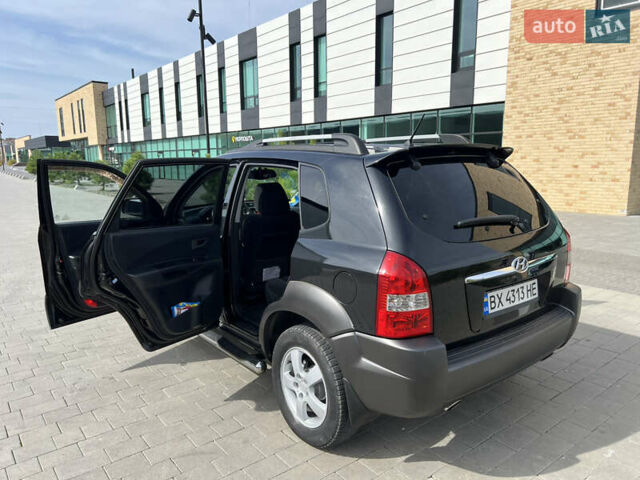 Чорний Хендай Туксон, об'ємом двигуна 2 л та пробігом 255 тис. км за 6900 $, фото 28 на Automoto.ua