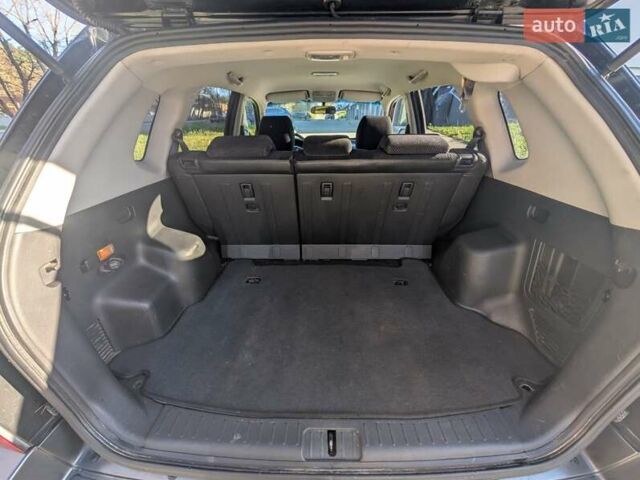 Черный Хендай Туксон, объемом двигателя 1.98 л и пробегом 226 тыс. км за 6500 $, фото 13 на Automoto.ua