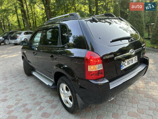 Черный Хендай Туксон, объемом двигателя 2 л и пробегом 210 тыс. км за 6600 $, фото 33 на Automoto.ua