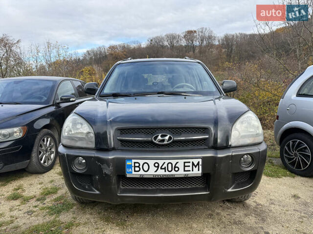 Черный Хендай Туксон, объемом двигателя 2 л и пробегом 211 тыс. км за 4444 $, фото 2 на Automoto.ua