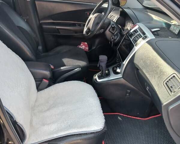 Черный Хендай Туксон, объемом двигателя 2 л и пробегом 315 тыс. км за 7000 $, фото 9 на Automoto.ua