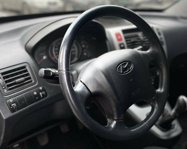 Чорний Хендай Туксон, об'ємом двигуна 1.98 л та пробігом 225 тис. км за 6600 $, фото 12 на Automoto.ua