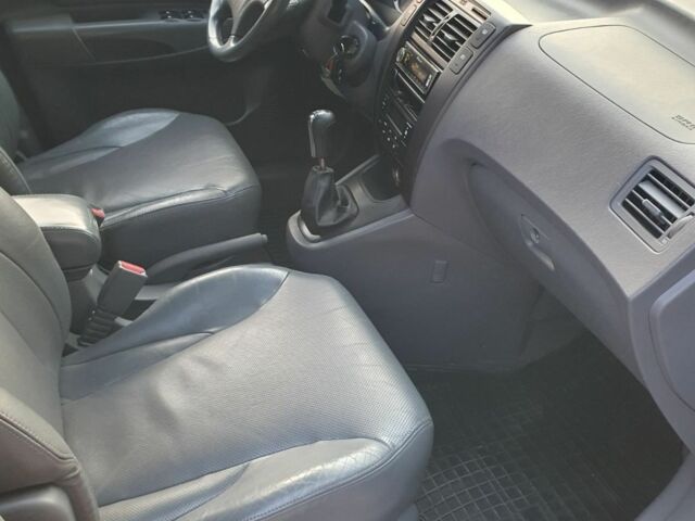 Черный Хендай Туксон, объемом двигателя 2 л и пробегом 137 тыс. км за 7499 $, фото 14 на Automoto.ua