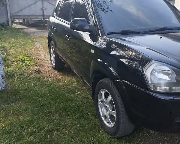 Чорний Хендай Туксон, об'ємом двигуна 1.98 л та пробігом 179 тис. км за 8000 $, фото 4 на Automoto.ua