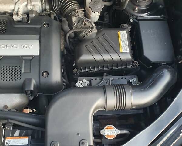 Чорний Хендай Туксон, об'ємом двигуна 1.98 л та пробігом 137 тис. км за 7599 $, фото 27 на Automoto.ua