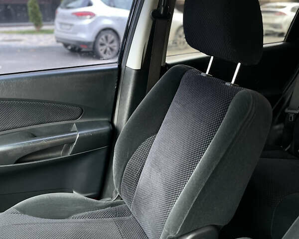 Чорний Хендай Туксон, об'ємом двигуна 1.98 л та пробігом 225 тис. км за 6600 $, фото 15 на Automoto.ua