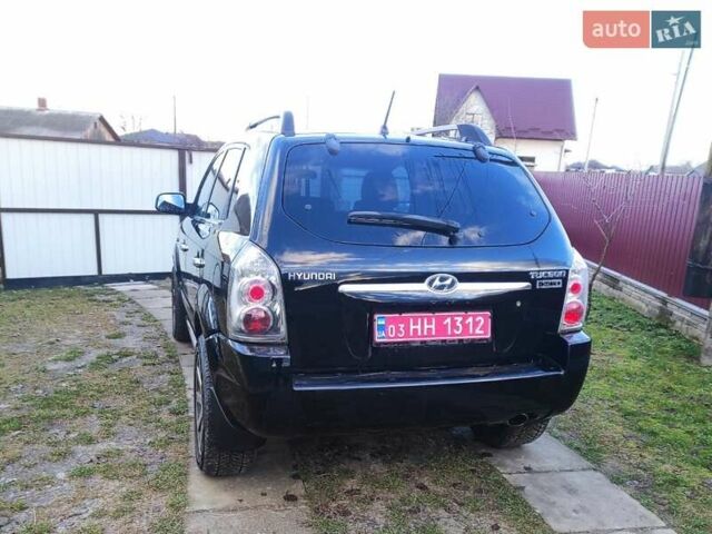 Черный Хендай Туксон, объемом двигателя 2 л и пробегом 208 тыс. км за 6950 $, фото 43 на Automoto.ua
