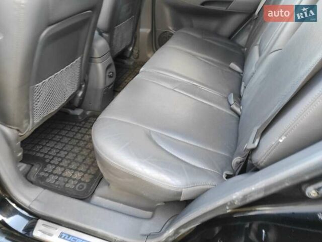 Черный Хендай Туксон, объемом двигателя 2 л и пробегом 208 тыс. км за 6950 $, фото 20 на Automoto.ua