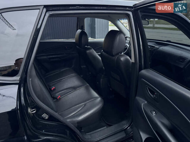 Хендай Туксон 2005 у Полтаві на Automoto.ua Чорний Хендай Туксон, об'ємом двигуна 1.98 л та пробігом 175 тис. км за 7700 $, фото 17 на Automoto.ua