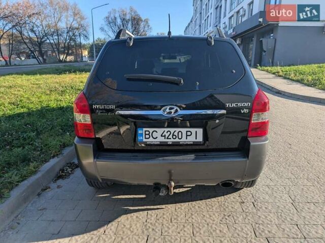 Черный Хендай Туксон, объемом двигателя 1.98 л и пробегом 226 тыс. км за 6500 $, фото 10 на Automoto.ua