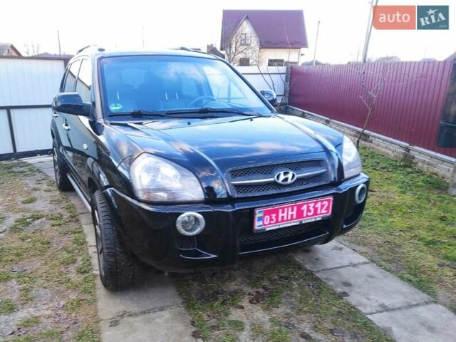 Черный Хендай Туксон, объемом двигателя 2 л и пробегом 208 тыс. км за 6950 $, фото 3 на Automoto.ua