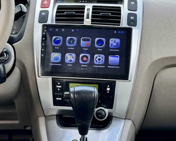 Черный Хендай Туксон, объемом двигателя 2 л и пробегом 225 тыс. км за 7900 $, фото 35 на Automoto.ua