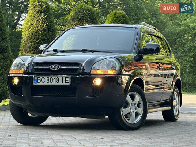 Черный Хендай Туксон, объемом двигателя 2 л и пробегом 210 тыс. км за 6600 $, фото 10 на Automoto.ua