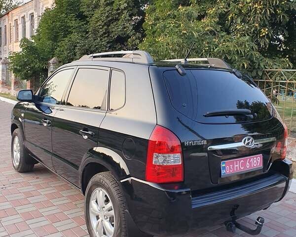 Чорний Хендай Туксон, об'ємом двигуна 1.98 л та пробігом 137 тис. км за 7599 $, фото 14 на Automoto.ua