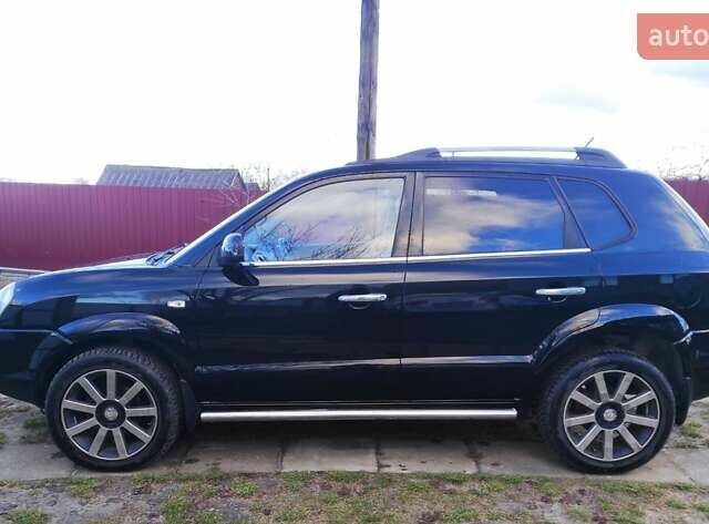 Черный Хендай Туксон, объемом двигателя 2 л и пробегом 208 тыс. км за 6950 $, фото 30 на Automoto.ua
