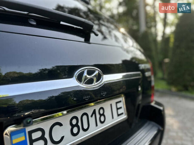 Черный Хендай Туксон, объемом двигателя 2 л и пробегом 210 тыс. км за 6600 $, фото 32 на Automoto.ua