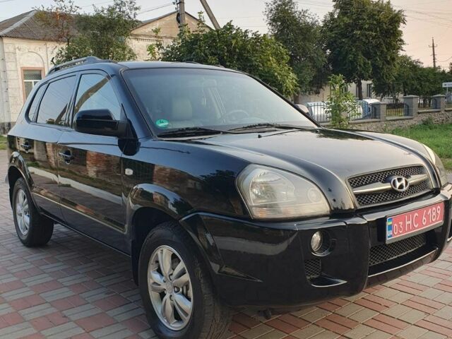 Черный Хендай Туксон, объемом двигателя 2 л и пробегом 137 тыс. км за 7499 $, фото 4 на Automoto.ua