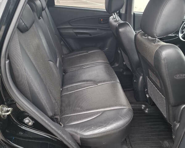 Черный Хендай Туксон, объемом двигателя 2 л и пробегом 170 тыс. км за 6999 $, фото 9 на Automoto.ua