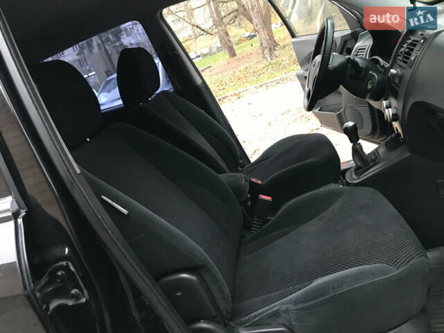 Черный Хендай Туксон, объемом двигателя 2 л и пробегом 261 тыс. км за 6500 $, фото 23 на Automoto.ua