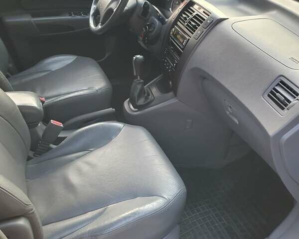 Чорний Хендай Туксон, об'ємом двигуна 1.98 л та пробігом 137 тис. км за 7599 $, фото 23 на Automoto.ua